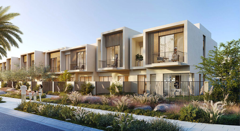 a row of houses with a fence